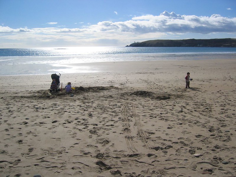Kids Digging on Red Strand